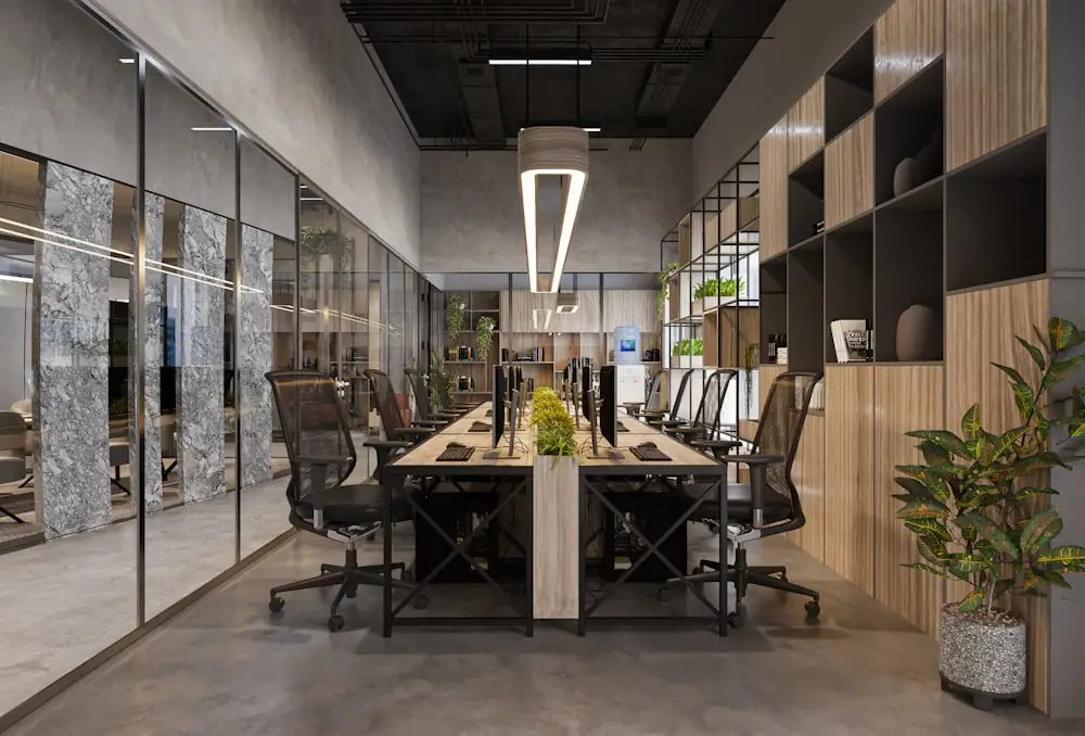 A long boardroom table in a quiet modern office