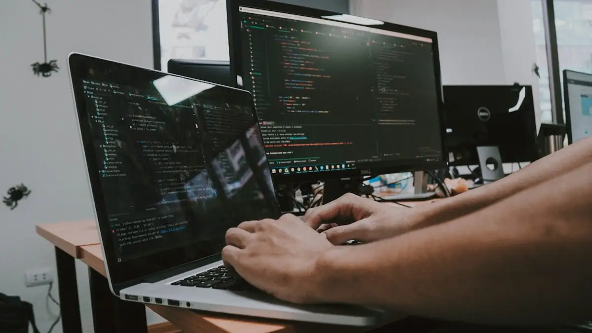 A developer working at a laptop
