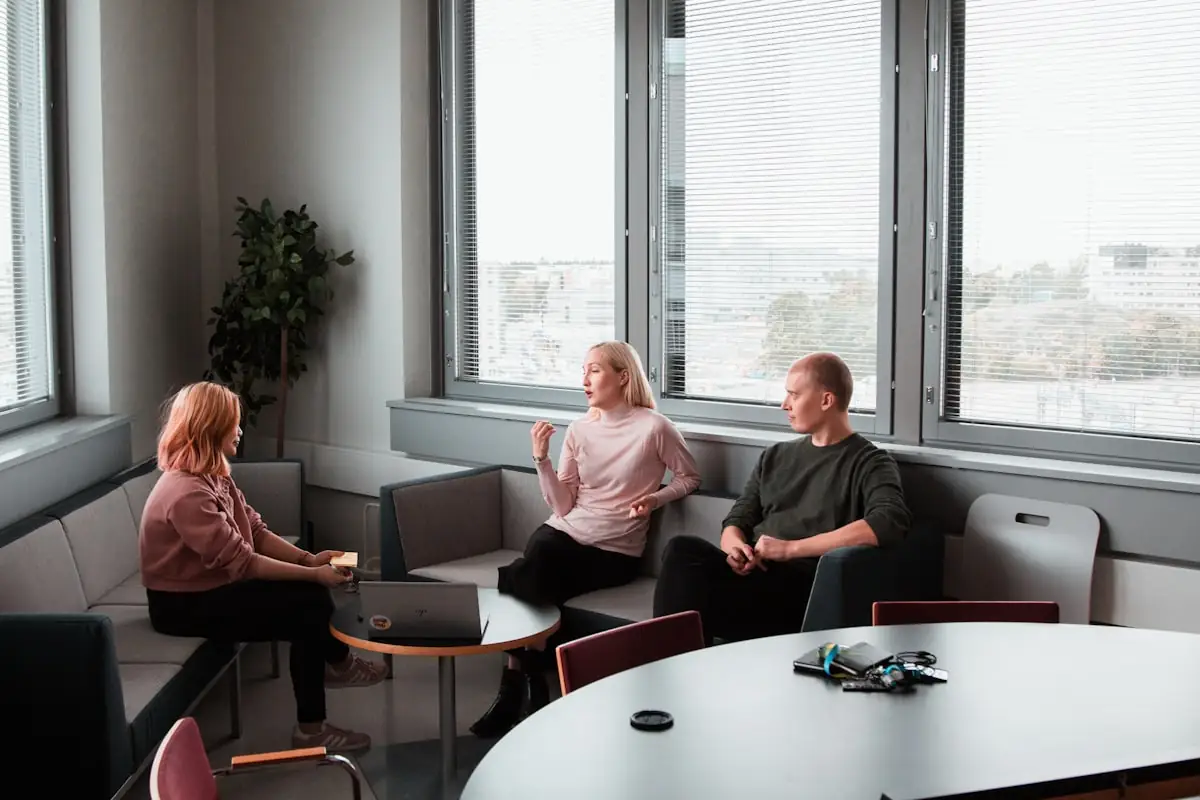 Two colleagues in conversation in an office